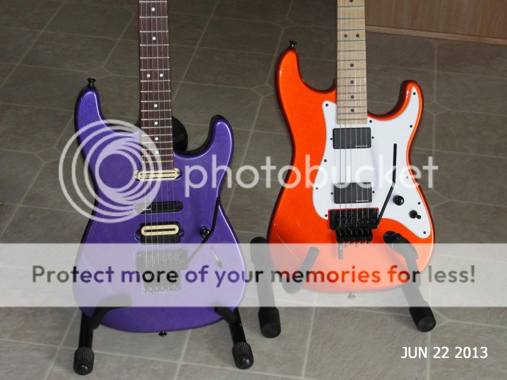Finally, if you stayed through and read through all of that... wow. thank you. Here's a pic of my two Charvels. Orange Crush on the right would be the woofy ...